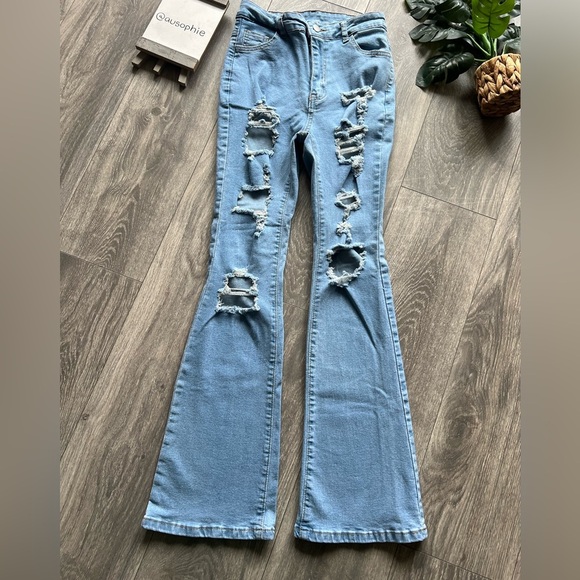 Shein high waisted ripped flared jeans in light wash blue. Size petite M/6 - Picture 6 of 13
